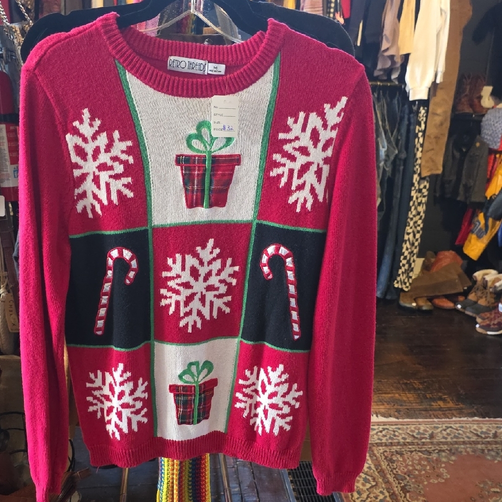 Festive Red Holiday Sweater with Snowflake and Candy Cane Design